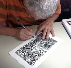 Fabio Sironi, l'illustratore del Corriere della Sera, al lavoro